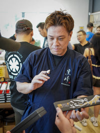 Kurosaki Signing for Customers at Knives and Stones EventKurosaki 2026 Sydney Tour